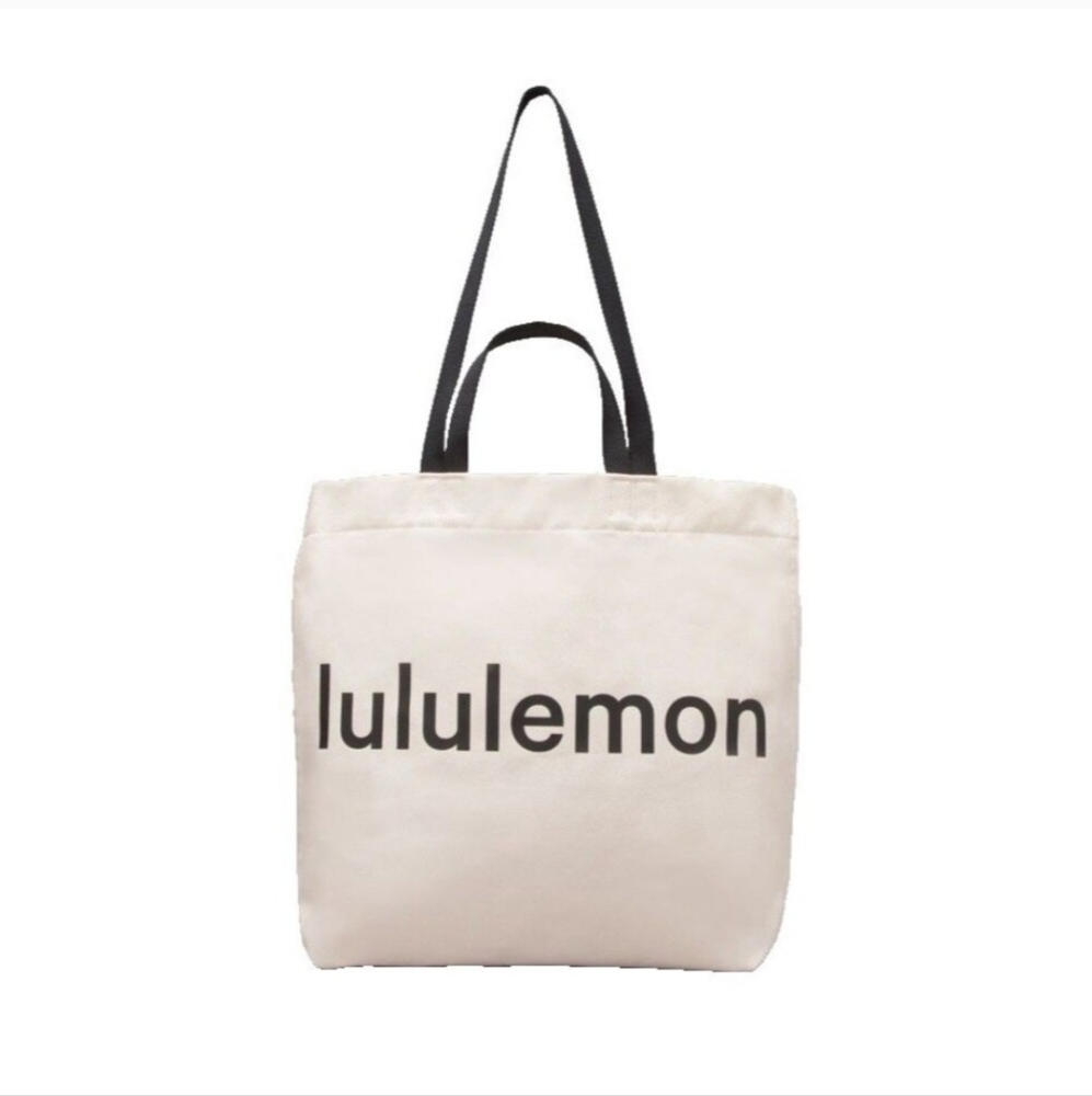 Lululemon Athletica White Canvas Tote with Black Handles